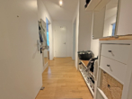 Helle 2-Zimmer-Wohnung mit Südbalkon und Einbauküche in zentraler aber ruhiger Lage von Pasing - Bild