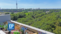 Weitblick, Sonne & Raum: Renovierte 4-Zimmer-Wohnung in der denkmalgeschützten Olympia Pressestadt - Titelbild