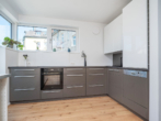 Neuwertige Dachterrassenwohnung mit zusätzlichem Ausbaupotenzial nahe der Theresienwiese - Bild