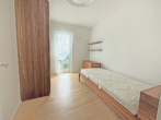 Exklusive 3-Zi-DG-Whg. mit großem Süd-Balkon, hochwertiger Möblierung und Tiefgarage - Bild